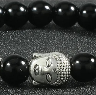 Obszidián és buddhafej